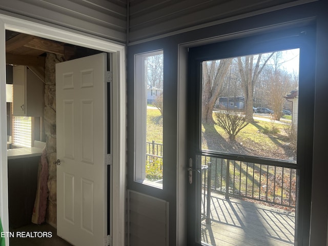 doorway to outside with plenty of natural light