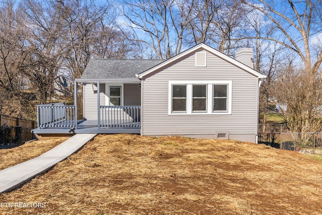 view of front of property with a deck