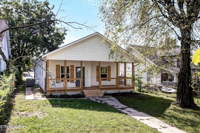 bungalow-style house featuring a front yard and a porch