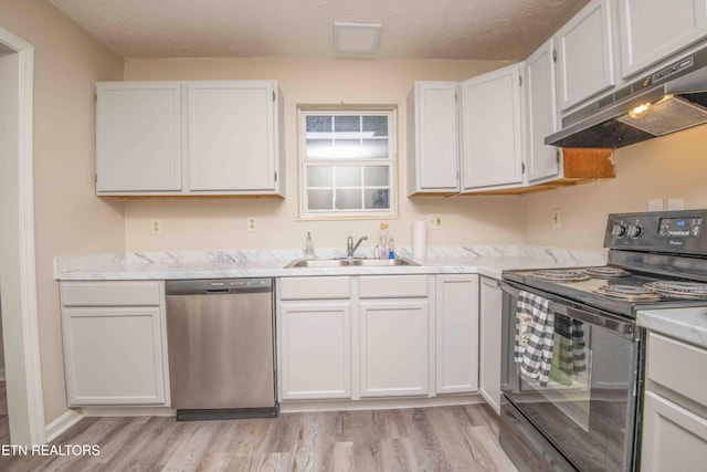 kitchen featuring sink, black electric range, stainless steel dishwasher, light hardwood / wood-style floors, and white cabinets