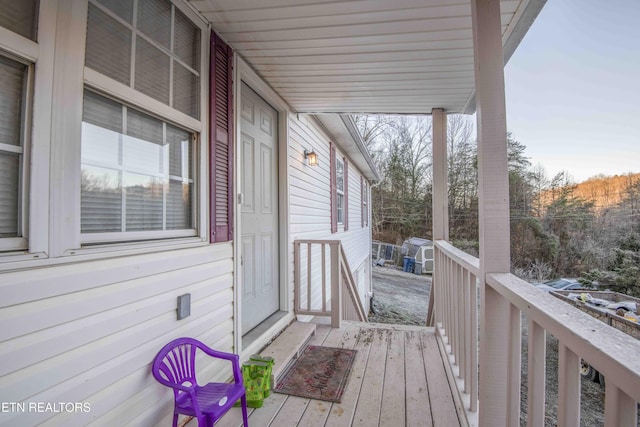 deck featuring covered porch