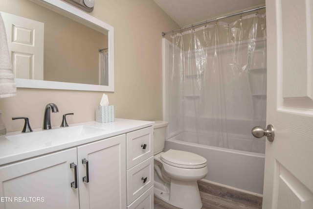 full bathroom featuring vanity, wood-type flooring, shower / bath combination with curtain, and toilet