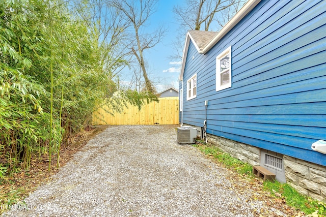 view of property exterior featuring central AC