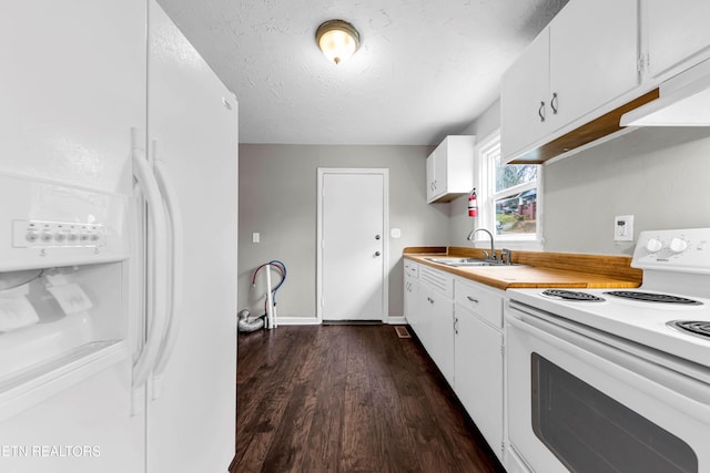 kitchen with white cabinetry, dark hardwood / wood-style flooring, white appliances, and sink