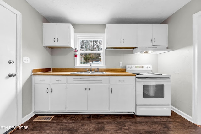 kitchen featuring sink, dark hardwood / wood-style flooring, extractor fan, electric stove, and white cabinets