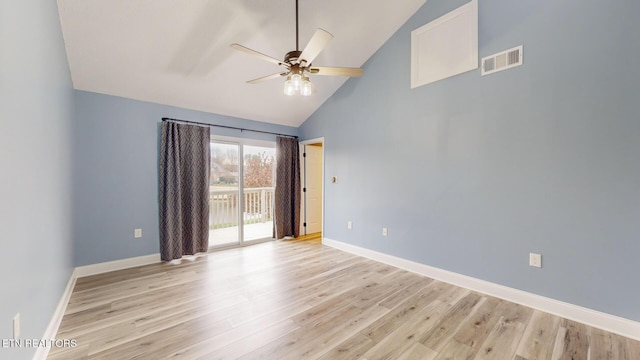 empty room featuring light wood-type flooring, visible vents, and baseboards