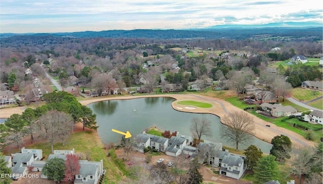 birds eye view of property featuring a water view and a residential view