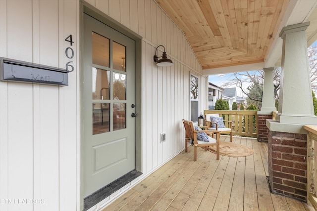 wooden deck featuring covered porch