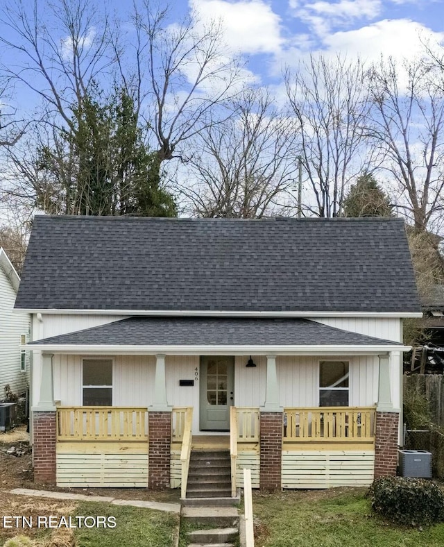 view of front of house featuring covered porch and central AC