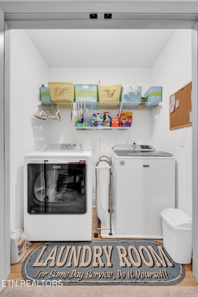 washroom featuring independent washer and dryer