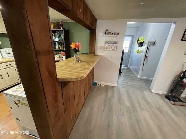 kitchen with light hardwood / wood-style flooring