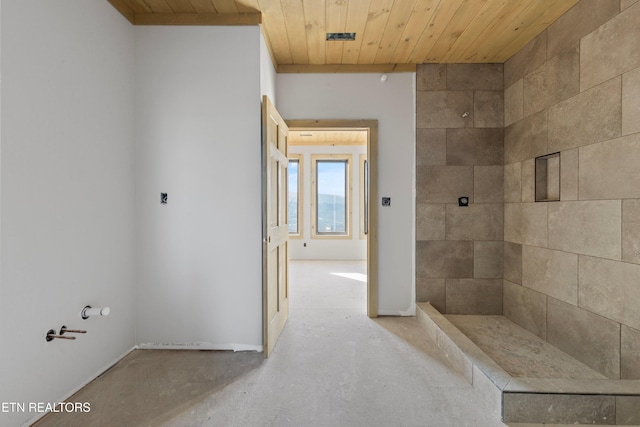 bathroom featuring concrete flooring and wooden ceiling