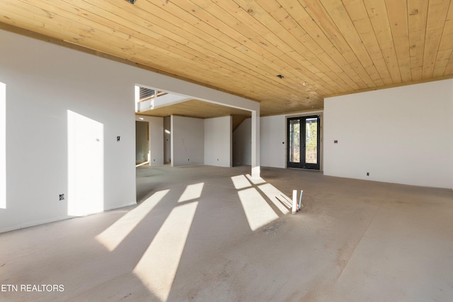 interior space featuring french doors and wood ceiling