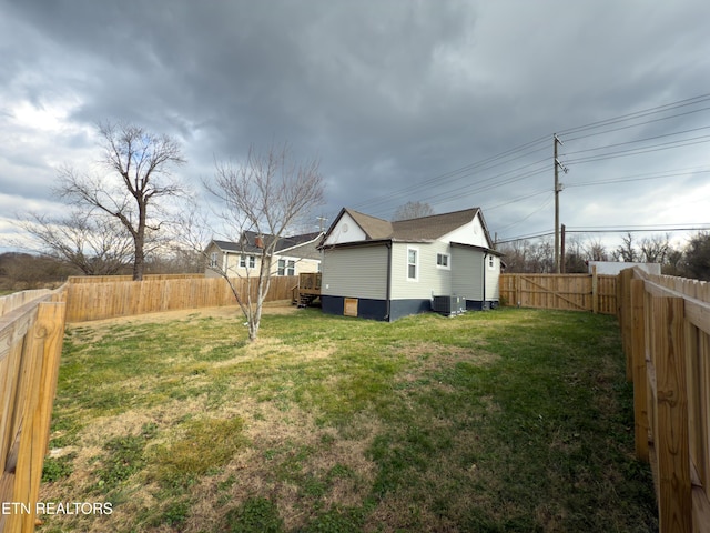 view of yard featuring central AC