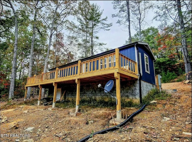 rear view of house with a deck