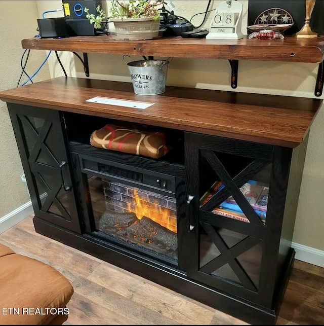 interior details with hardwood / wood-style floors