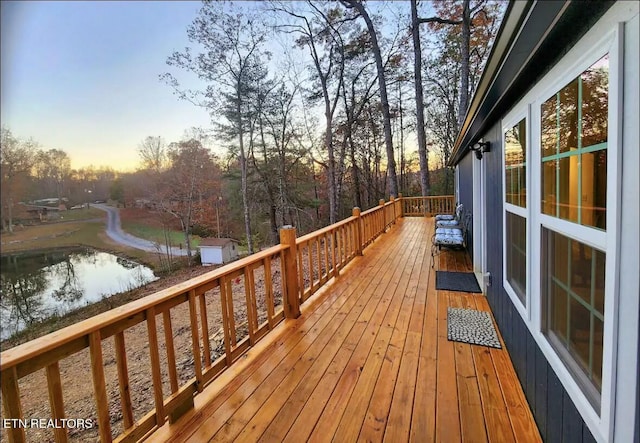 deck at dusk with a water view