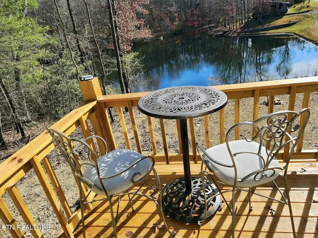 balcony with a deck with water view