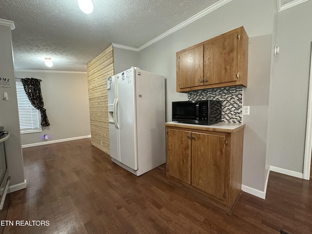 kitchen featuring white refrigerator with ice dispenser, dark wood-type flooring, a textured ceiling, ornamental molding, and decorative backsplash