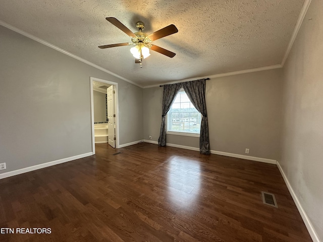 spare room featuring ornamental molding, ceiling fan, a textured ceiling, and dark hardwood / wood-style flooring