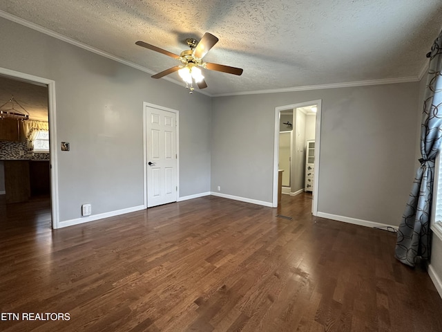 unfurnished bedroom with ceiling fan, crown molding, dark hardwood / wood-style floors, and a textured ceiling