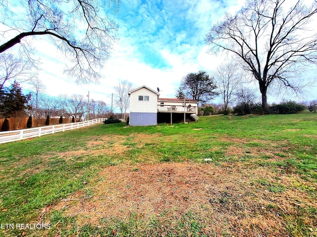 view of yard with a deck