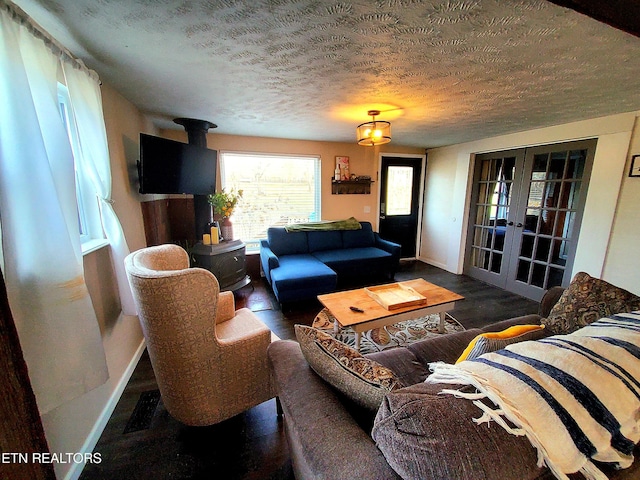 1471 Harold Patterson Rd, Dandridge, TN 37725 - living area featuring a textured ceiling, french doors, and wood finished floors