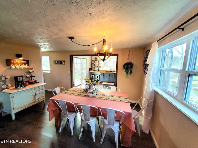 1471 Harold Patterson Rd, Dandridge, TN 37725 - dining area featuring a chandelier and a textured ceiling