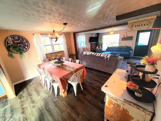 1471 Harold Patterson Rd, Dandridge, TN 37725 - dining area with a chandelier, dark wood-type flooring, plenty of natural light, and a textured ceiling