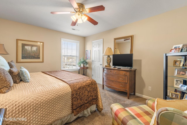 carpeted bedroom featuring ceiling fan