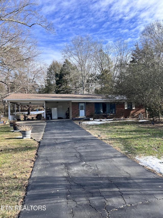 view of front of house featuring a carport