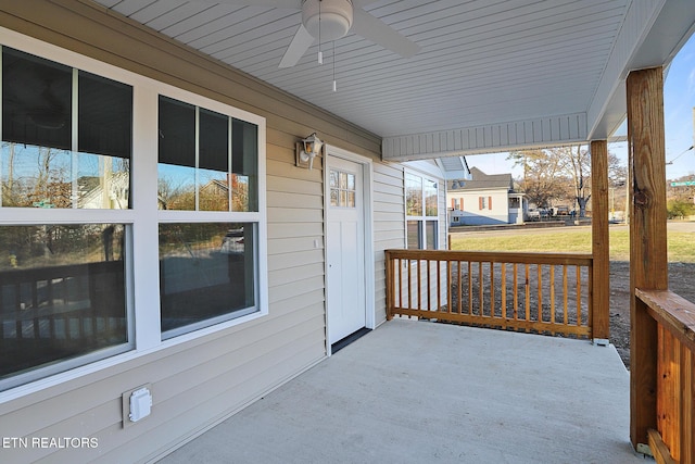 view of patio with a porch and ceiling fan