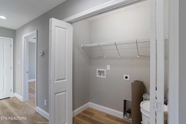 washroom featuring washer hookup and electric dryer hookup