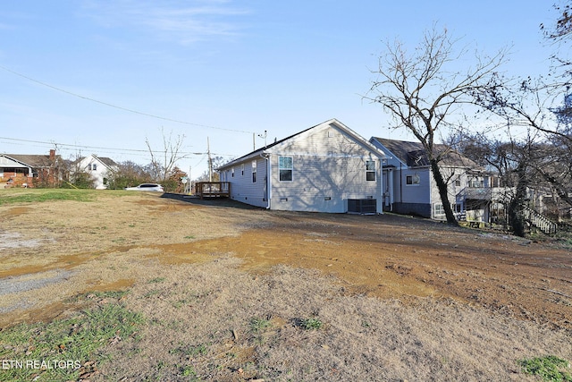 view of side of property featuring cooling unit