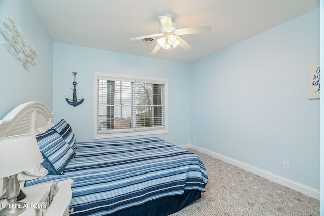 bedroom featuring ceiling fan and carpet floors