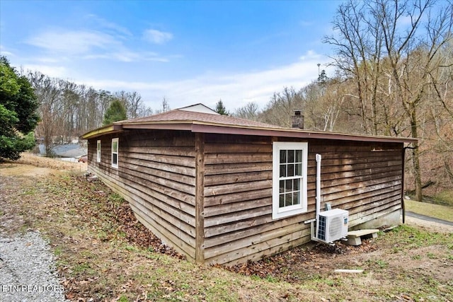 view of outdoor structure with ac unit