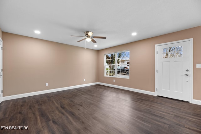 foyer entrance featuring dark hardwood / wood-style floors and ceiling fan