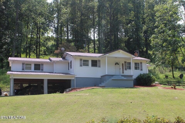 view of front of house with covered porch and a front yard