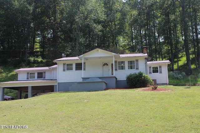 view of front of house with a porch and a front yard