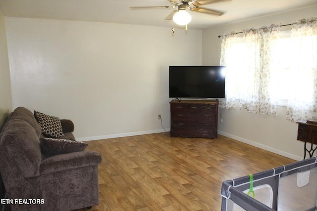 interior space with hardwood / wood-style floors and ceiling fan