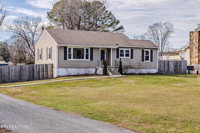 view of front of home with a front lawn