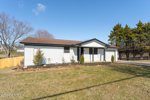 single story home with a front lawn and a garage