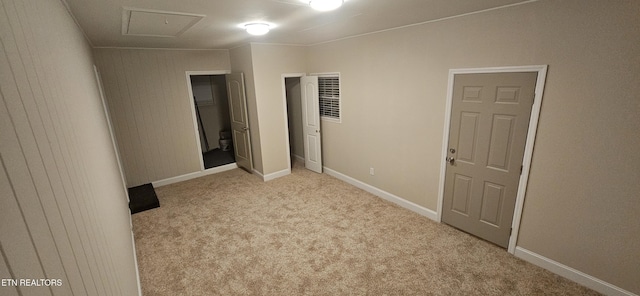 unfurnished bedroom featuring light colored carpet