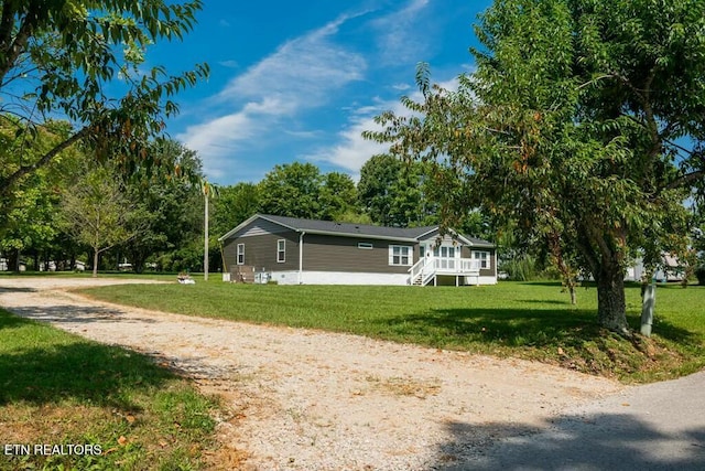 view of home's exterior featuring a lawn