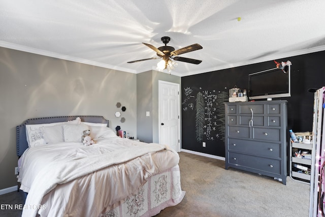 carpeted bedroom with a textured ceiling, ceiling fan, and crown molding