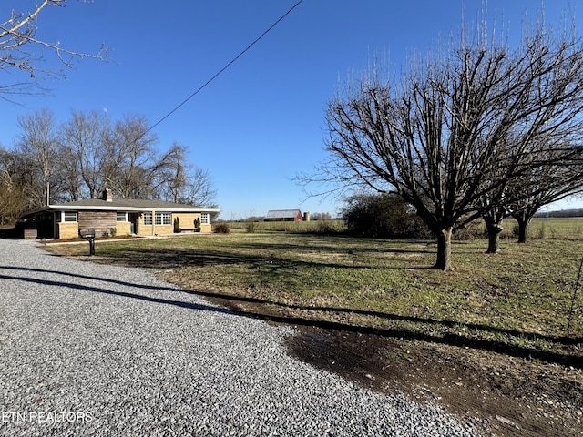 exterior space with a rural view