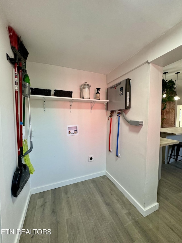 washroom featuring washer hookup and hardwood / wood-style flooring