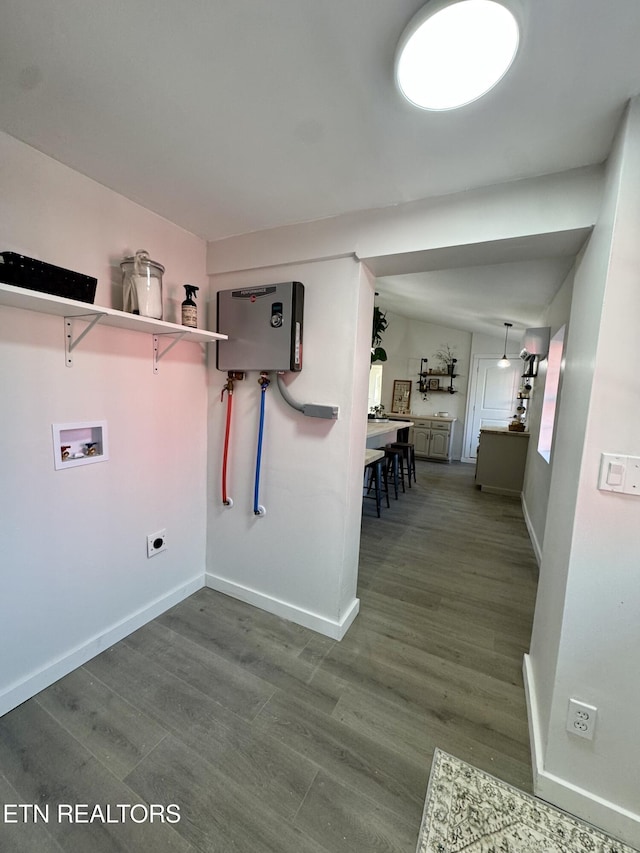 laundry area featuring hookup for a washing machine and hardwood / wood-style floors