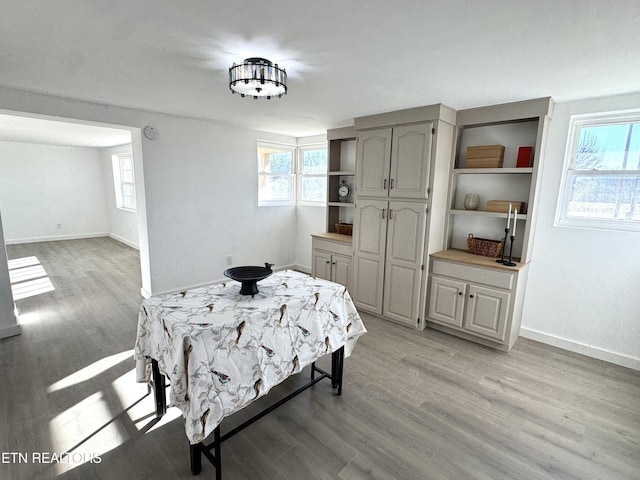 dining area featuring light wood-type flooring