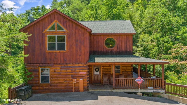 log home with a porch